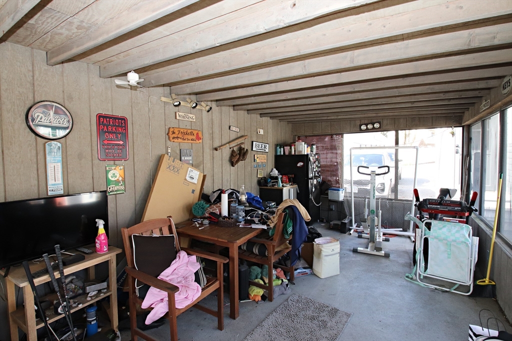 18 Nason Road Saugus, MA 01906 - Photo 28 of 31 a room with furniture and a flat screen tv