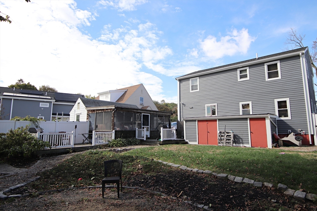 18 Nason Road Saugus, MA 01906 - Photo 30 of 31 a front view of a house with a yard
