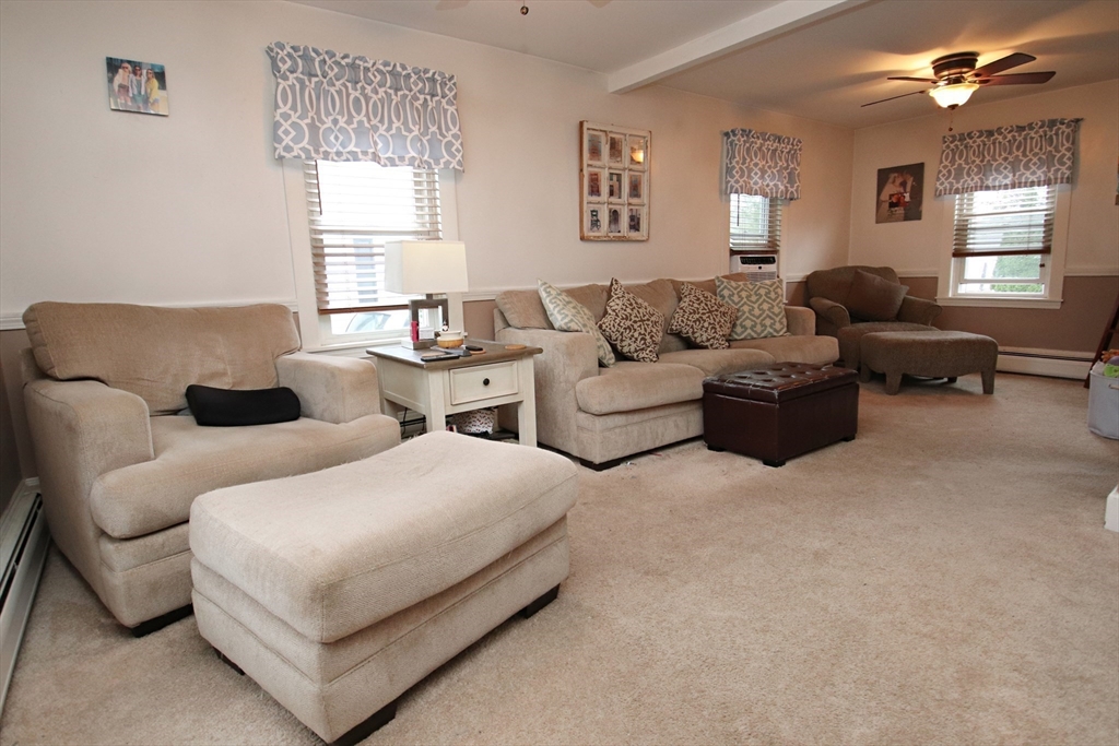 18 Nason Road Saugus, MA 01906 - Photo 8 of 31 a spacious bedroom with two beds and a couch