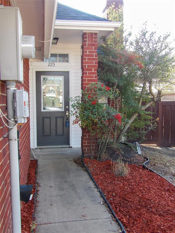 223 Juniper Ridge Court DeSoto, TX 75115 - Photo 2 of 33 Property entrance featuring water heater