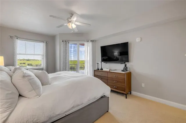 a bathroom with a bathtub and a double vanity sink