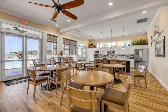 a kitchen with a sink a stove and cabinets