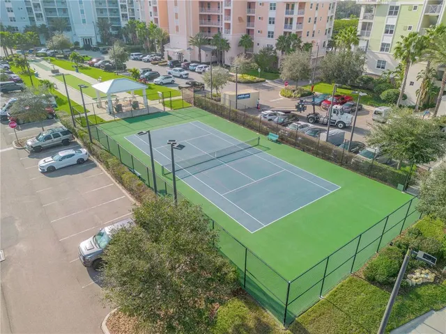 a room with gym equipment and a large window