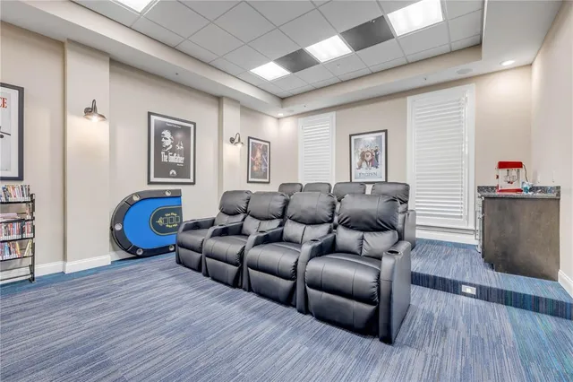 a view of parking garage with cars parked