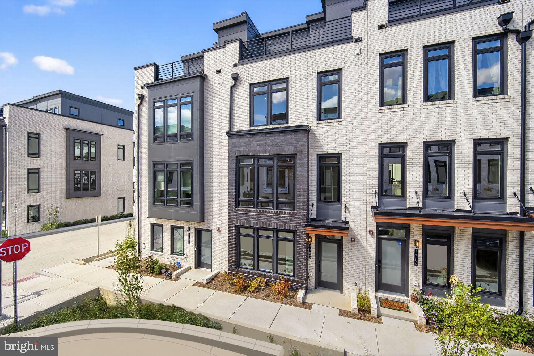 61 Lower Service Road Northwest, Unit HOMESITE 940 Washington, DC 20422 - Photo 2 of 26 a building entrance view of a building