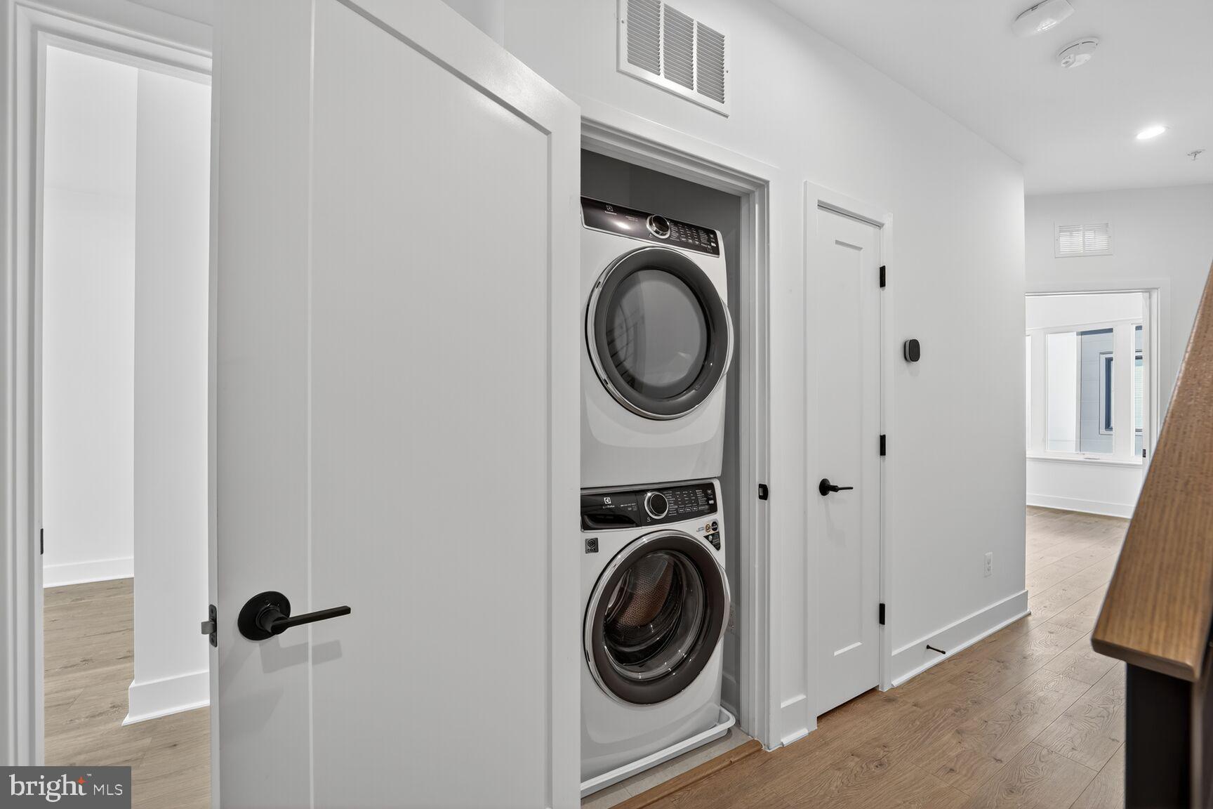 61 Lower Service Road Northwest, Unit HOMESITE 940 Washington, DC 20422 - Photo 21 of 26 a utility room with dryer and washer