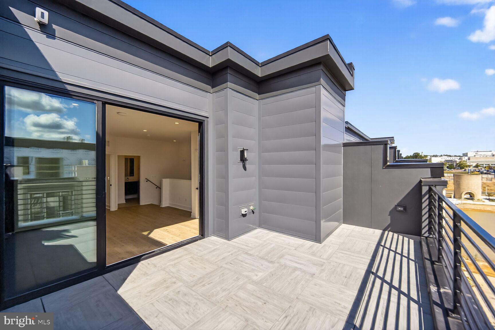 61 Lower Service Road Northwest, Unit HOMESITE 940 Washington, DC 20422 - Photo 4 of 26 a view of a balcony