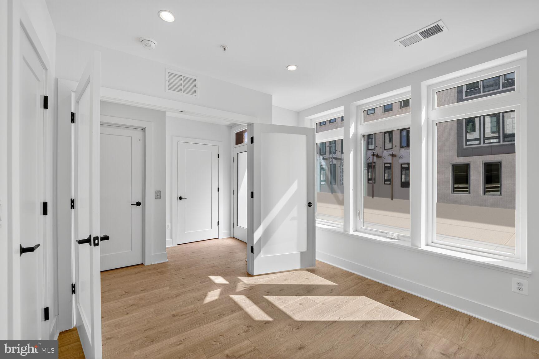 61 Lower Service Road Northwest, Unit HOMESITE 940 Washington, DC 20422 - Photo 10 of 26 a view of entryway with wooden floor and stairs