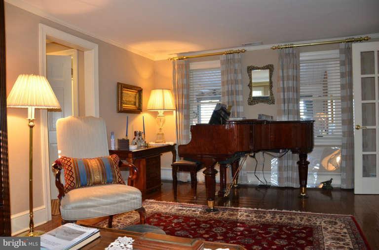7891 Fuller Road St. Michaels, MD 21663 - Photo 14 of 23 a living room with furniture and wooden floor