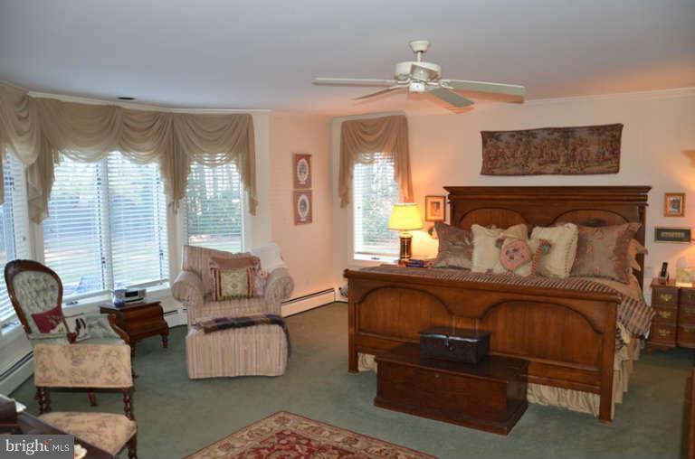 7891 Fuller Road St. Michaels, MD 21663 - Photo 22 of 23 a living room with furniture and a large window