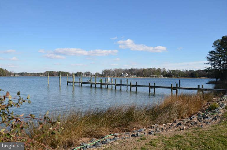 7891 Fuller Road St. Michaels, MD 21663 - Photo 5 of 23 a view of a lake with houses