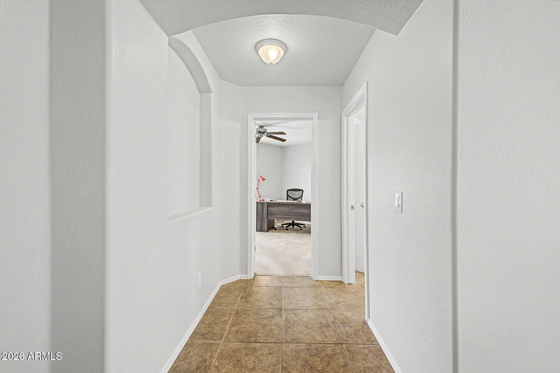 2101 South Meridian Road, Unit 133 Apache Junction, AZ 85120 - Photo 25 of 51 a view of a hallway view with wooden floor and a bathroom