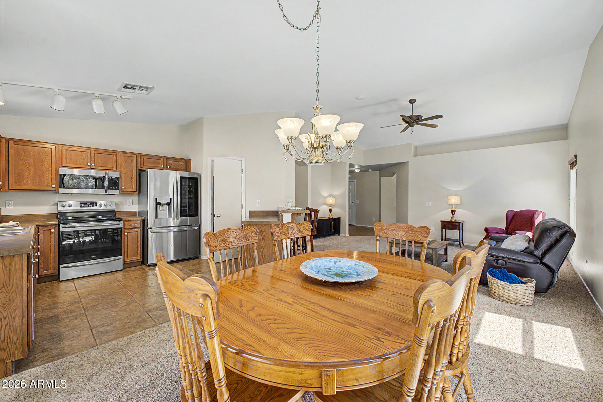 2101 South Meridian Road, Unit 133 Apache Junction, AZ 85120 - Photo 10 of 51 a view of a dining room with furniture