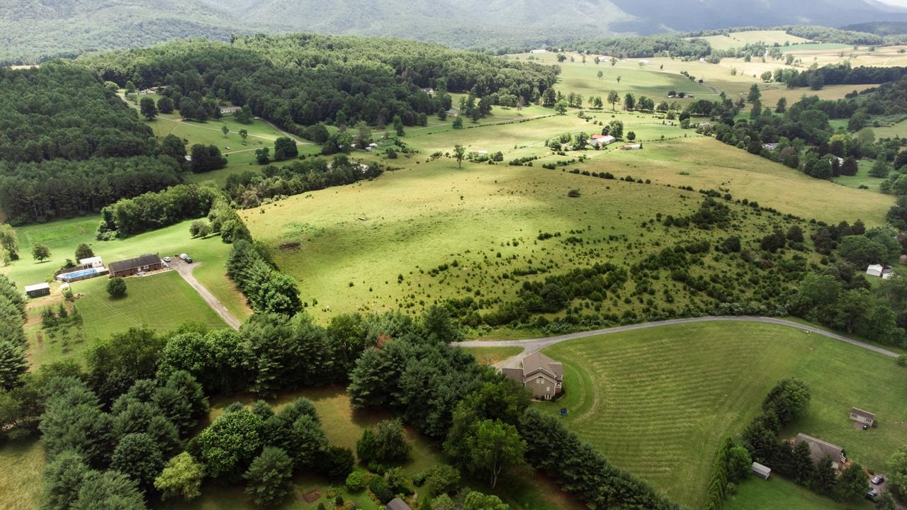Tbd Tem Lane Raphine, VA 24472 - Photo 31 of 51 an aerial view of residential houses with outdoor space and trees all around