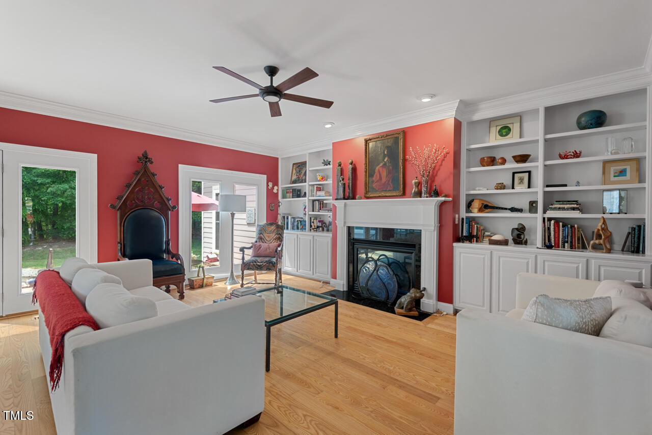30119 Settle Chapel Hill, NC 27517 - Photo 13 of 49 a living room with furniture and a fireplace