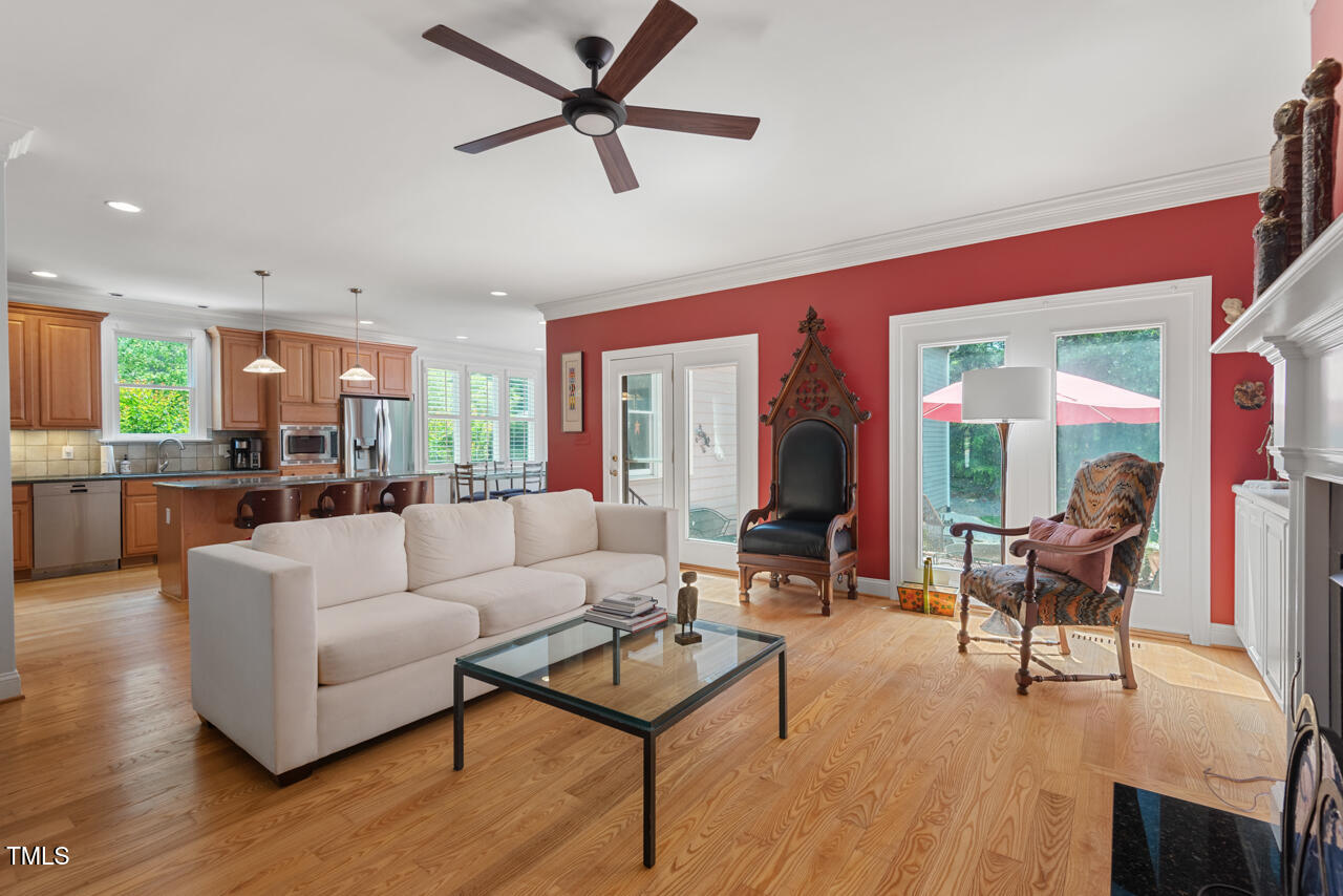 30119 Settle Chapel Hill, NC 27517 - Photo 15 of 49 a living room with furniture and a view of kitchen