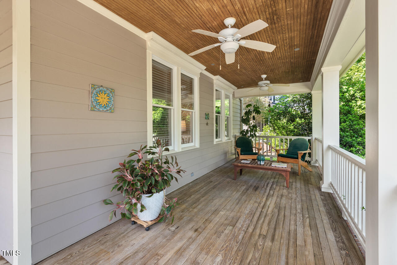 30119 Settle Chapel Hill, NC 27517 - Photo 2 of 49 a view of a porch with wooden floor