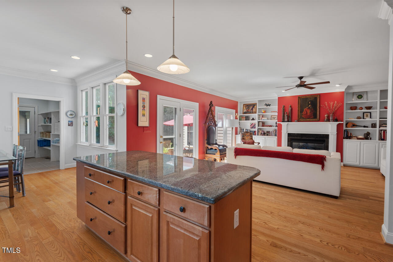 30119 Settle Chapel Hill, NC 27517 - Photo 21 of 49 a kitchen with stainless steel appliances granite countertop a stove and refrigerator