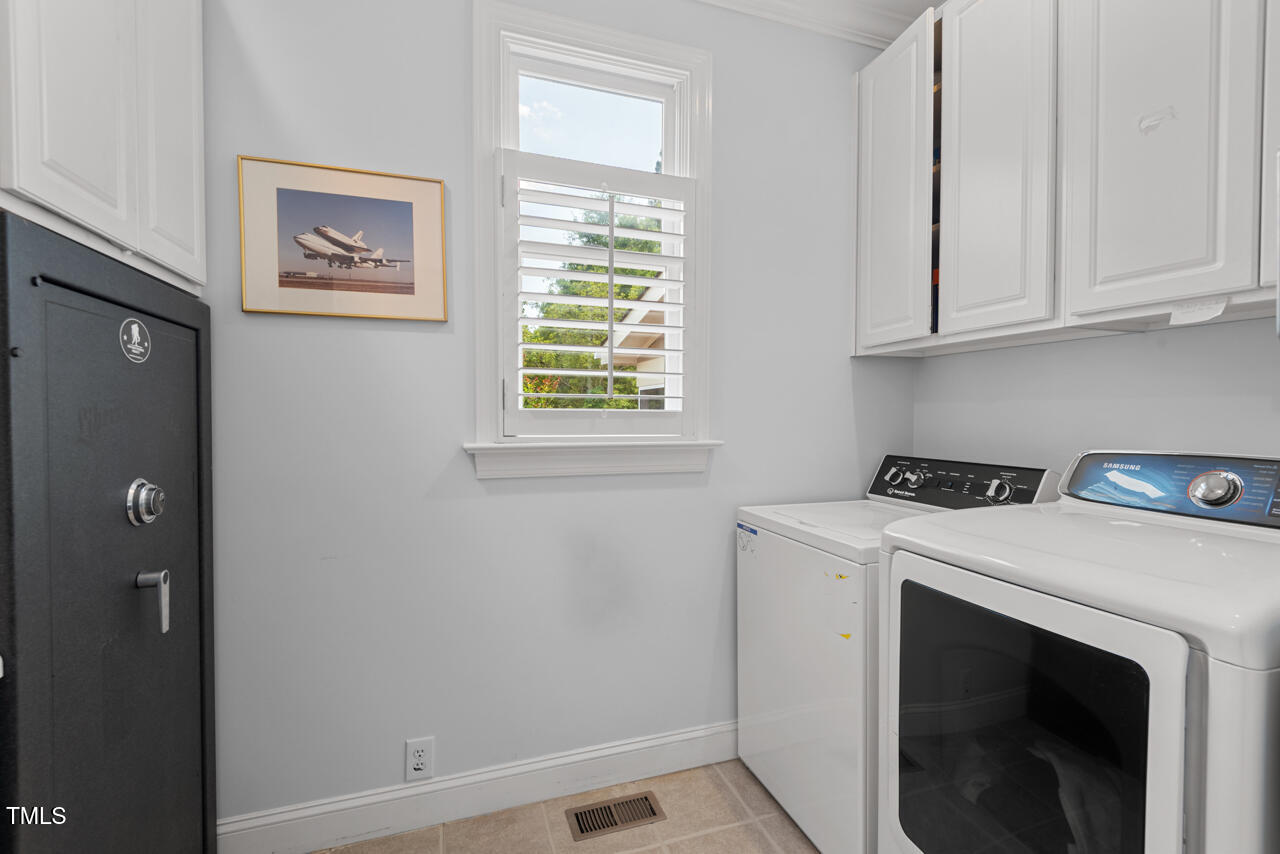 30119 Settle Chapel Hill, NC 27517 - Photo 25 of 49 a utility room with dryer and washer