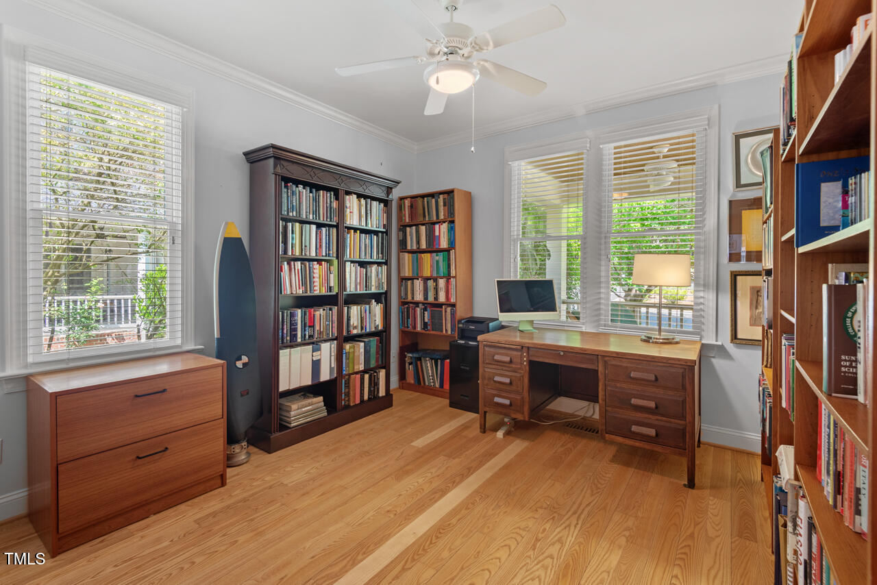 30119 Settle Chapel Hill, NC 27517 - Photo 30 of 49 a livingroom with workspace and a window