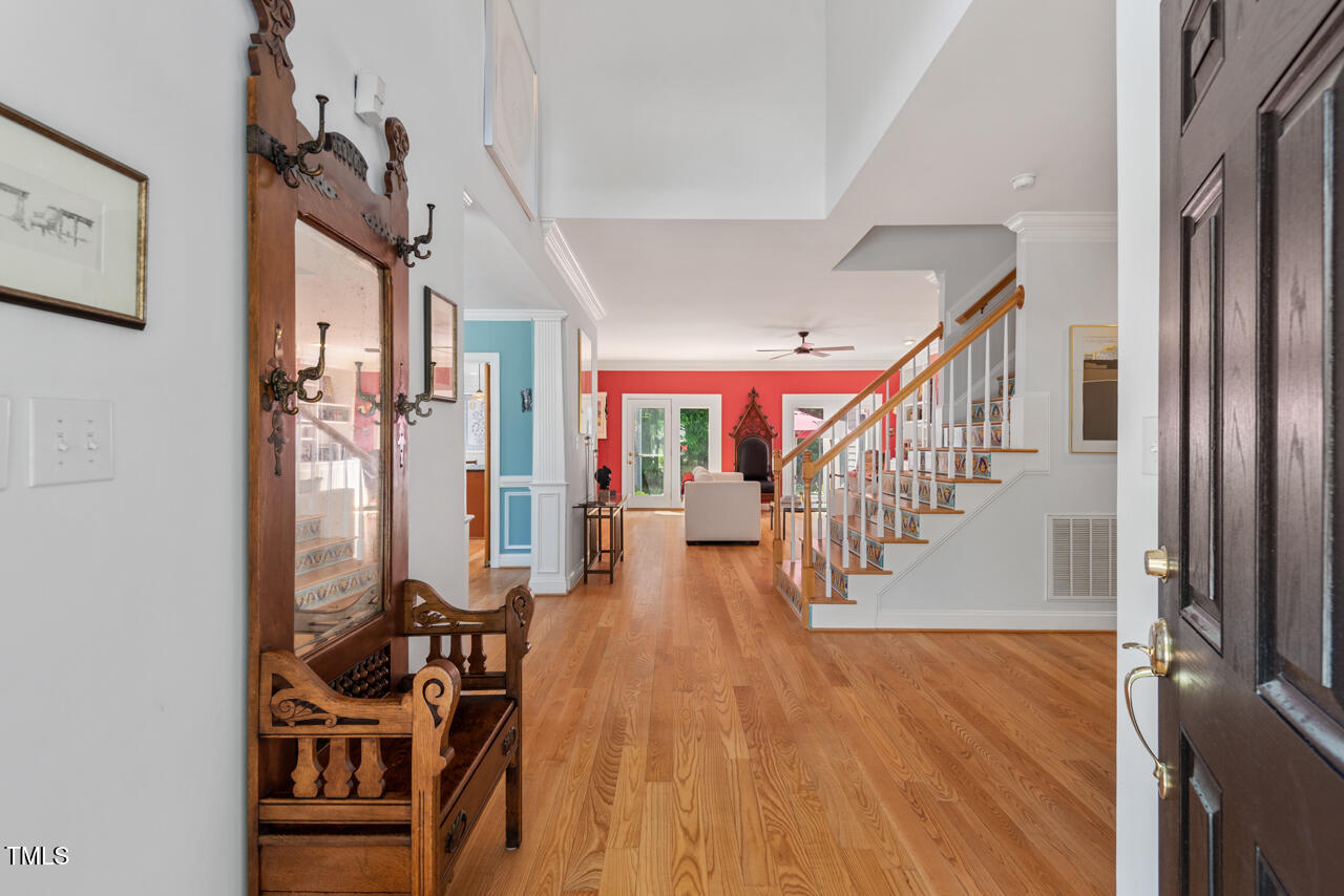 30119 Settle Chapel Hill, NC 27517 - Photo 3 of 49 a view of entryway and hall with wooden floor
