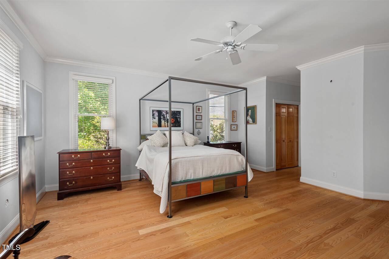 30119 Settle Chapel Hill, NC 27517 - Photo 34 of 49 a bedroom with a bed and a dresser