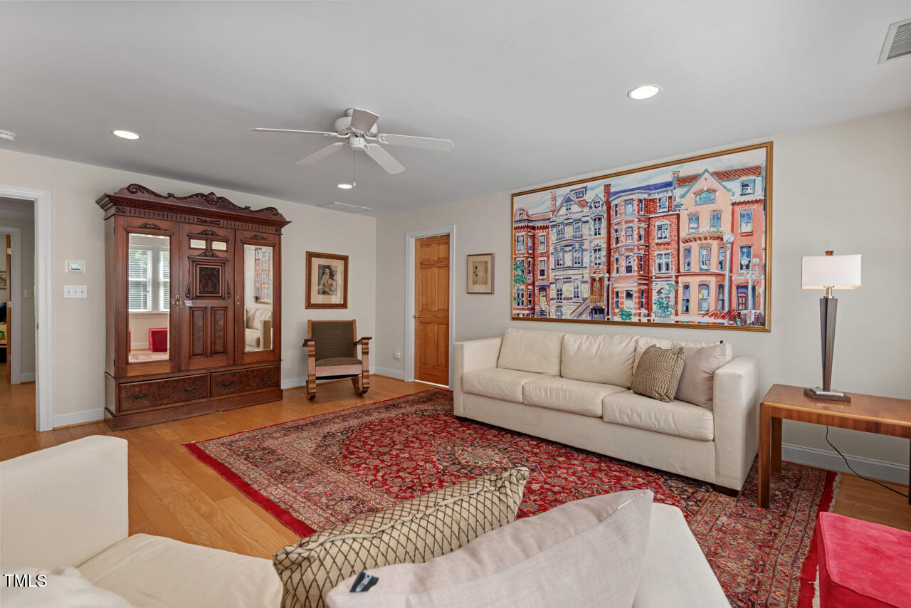 30119 Settle Chapel Hill, NC 27517 - Photo 43 of 49 a living room with furniture and wooden floor