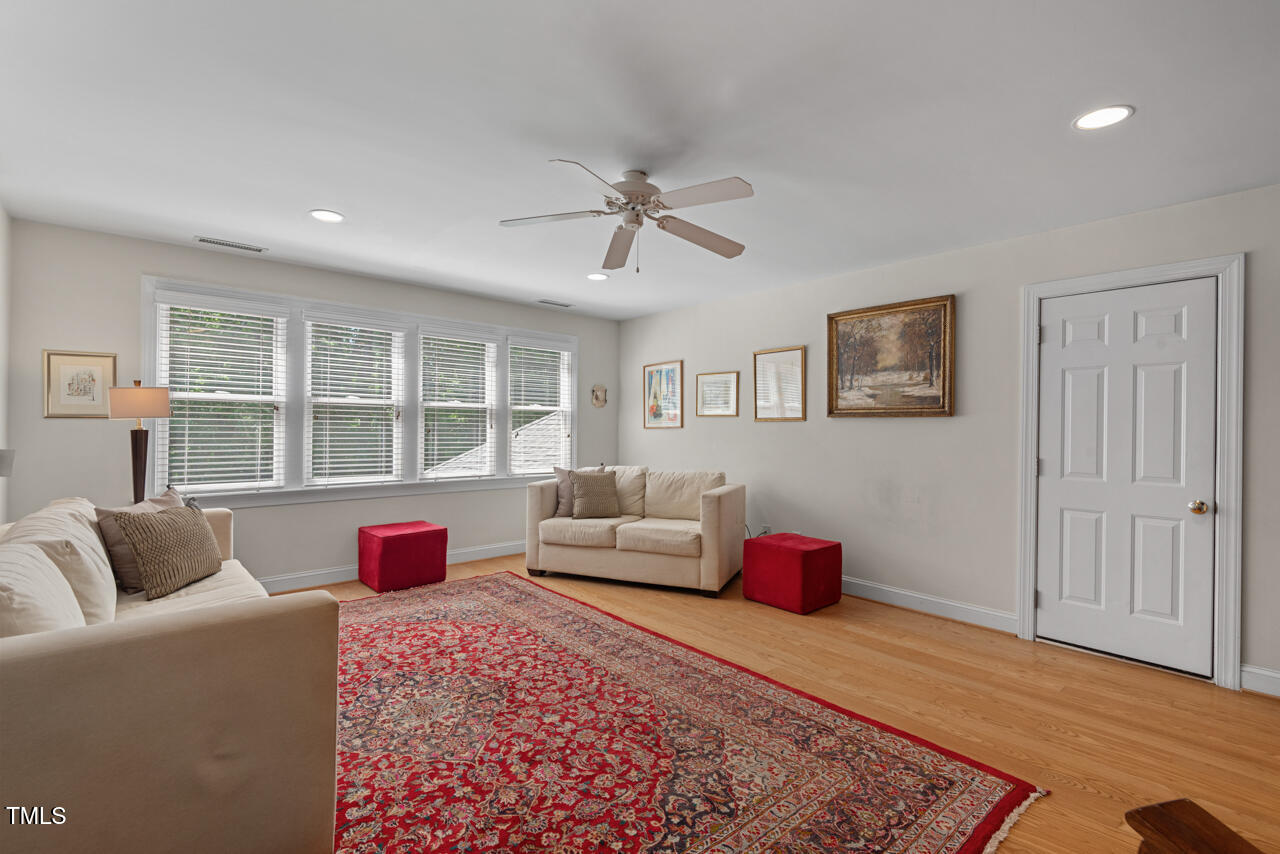 30119 Settle Chapel Hill, NC 27517 - Photo 44 of 49 a bedroom with furniture or couch and a window