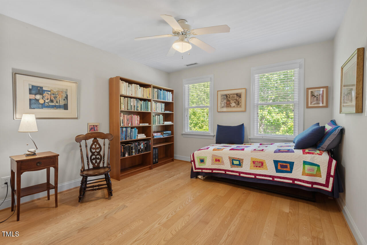 30119 Settle Chapel Hill, NC 27517 - Photo 45 of 49 a room with furniture and a window