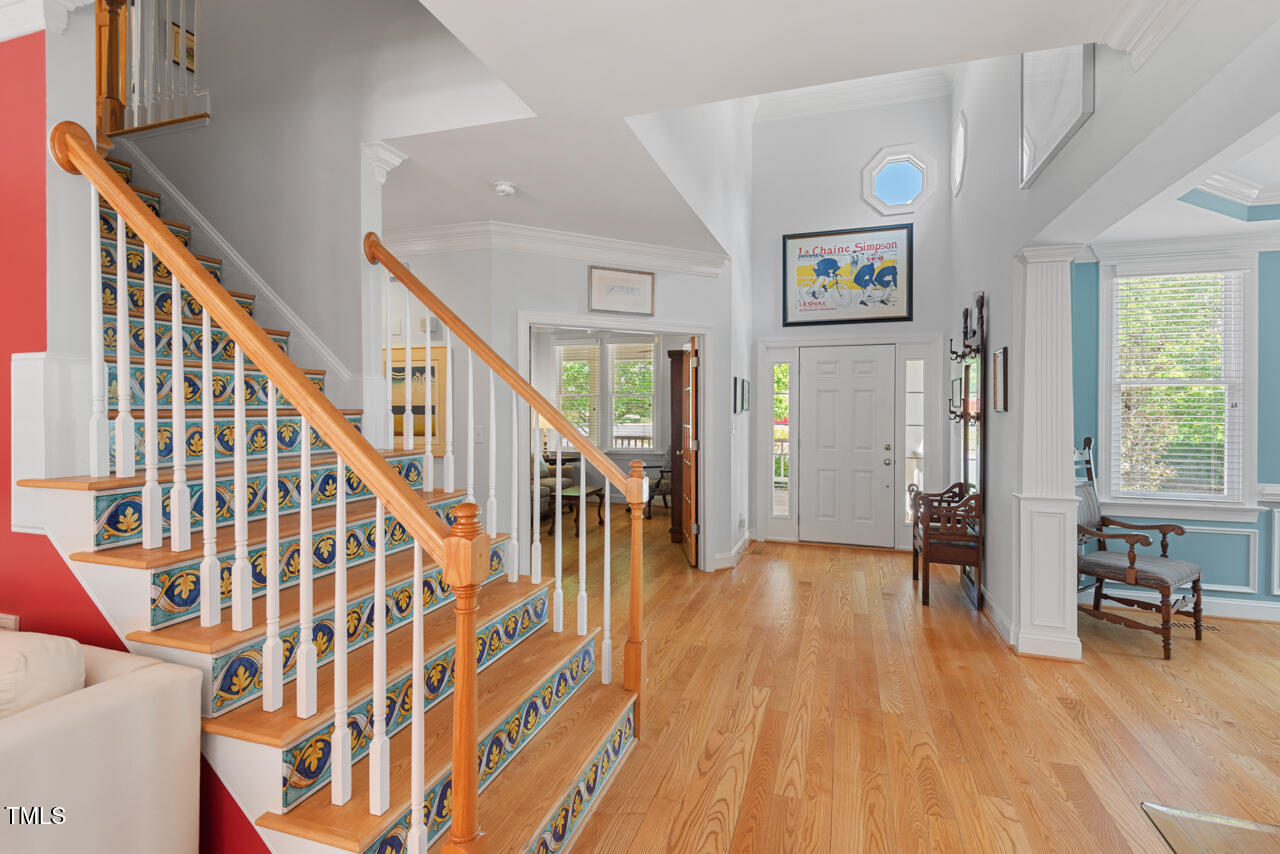30119 Settle Chapel Hill, NC 27517 - Photo 5 of 49 a view of an entryway with wooden floor