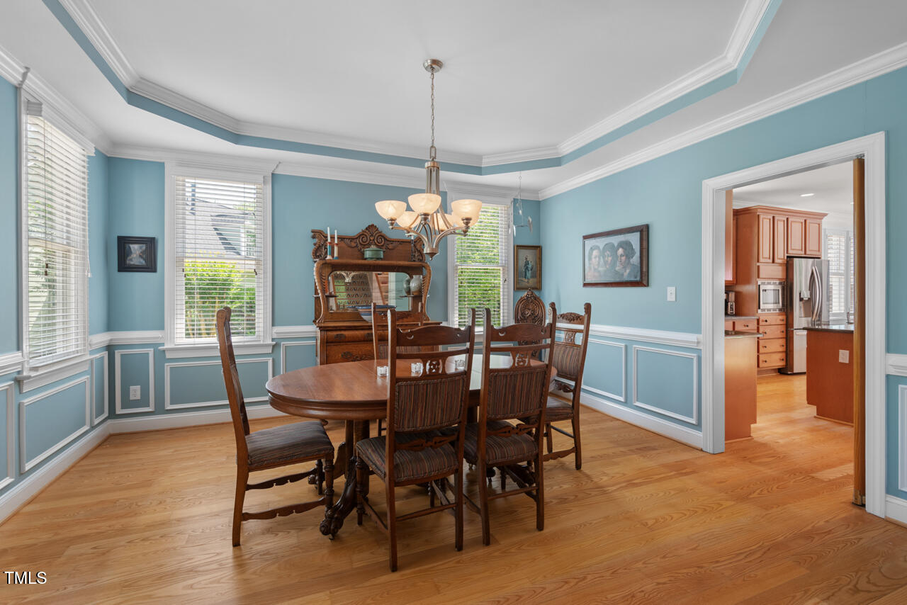 30119 Settle Chapel Hill, NC 27517 - Photo 8 of 49 a view of a dining room with furniture window and wooden floor