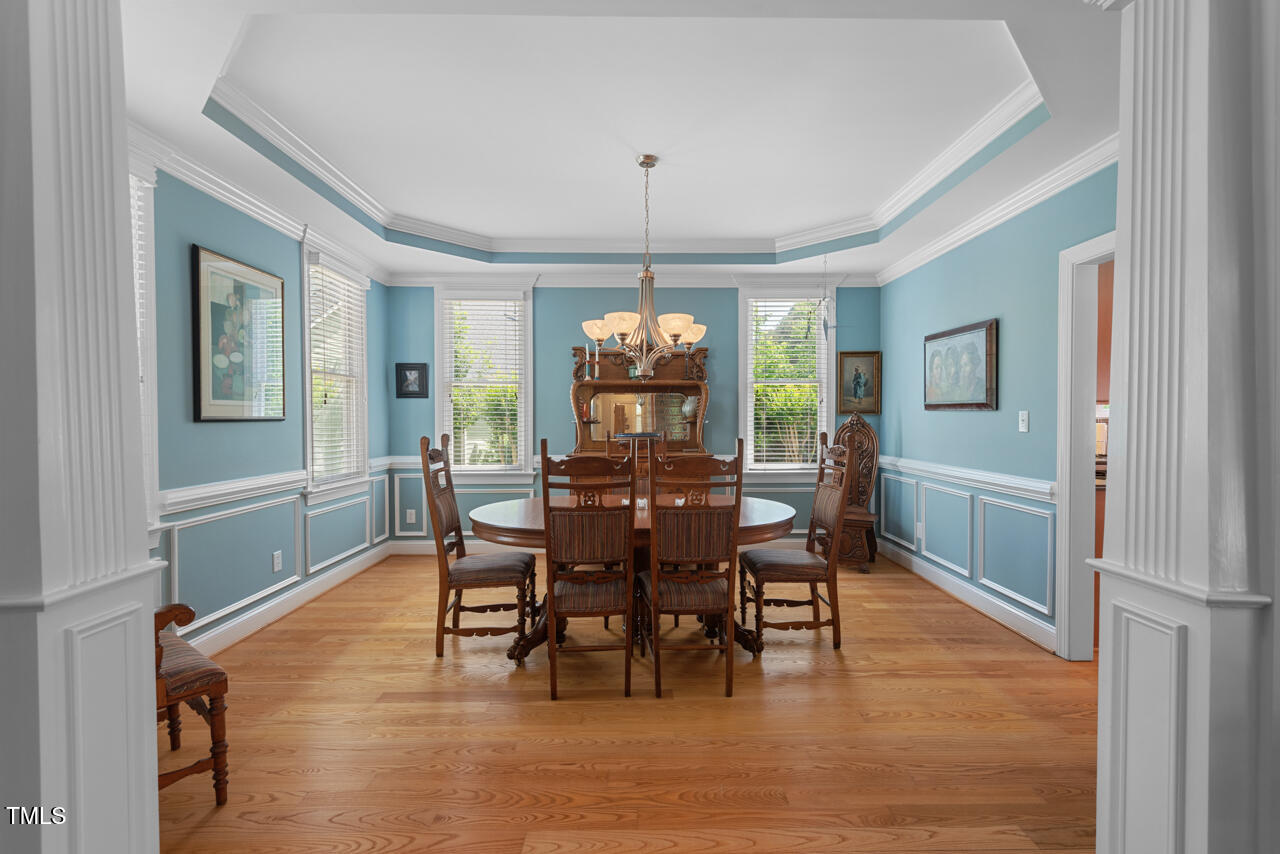 30119 Settle Chapel Hill, NC 27517 - Photo 9 of 49 a view of a dining room with furniture window and wooden floor