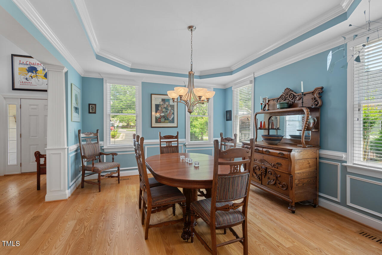 30119 Settle Chapel Hill, NC 27517 - Photo 10 of 49 a dining room with furniture window wooden floor