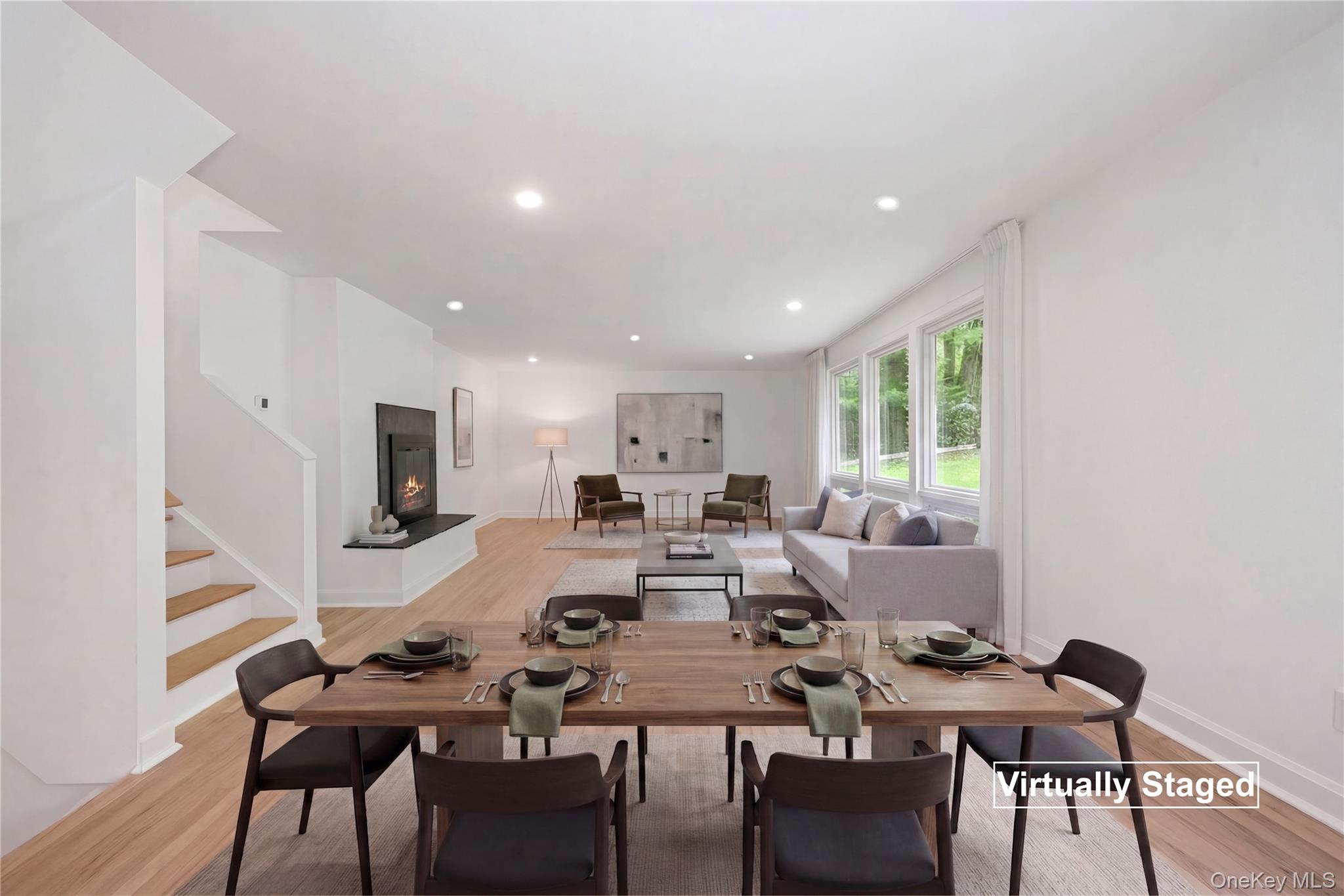 24 Country Road Mamaroneck, NY 10543 - Photo 2 of 37 a view of a dining room with furniture and wooden floor
