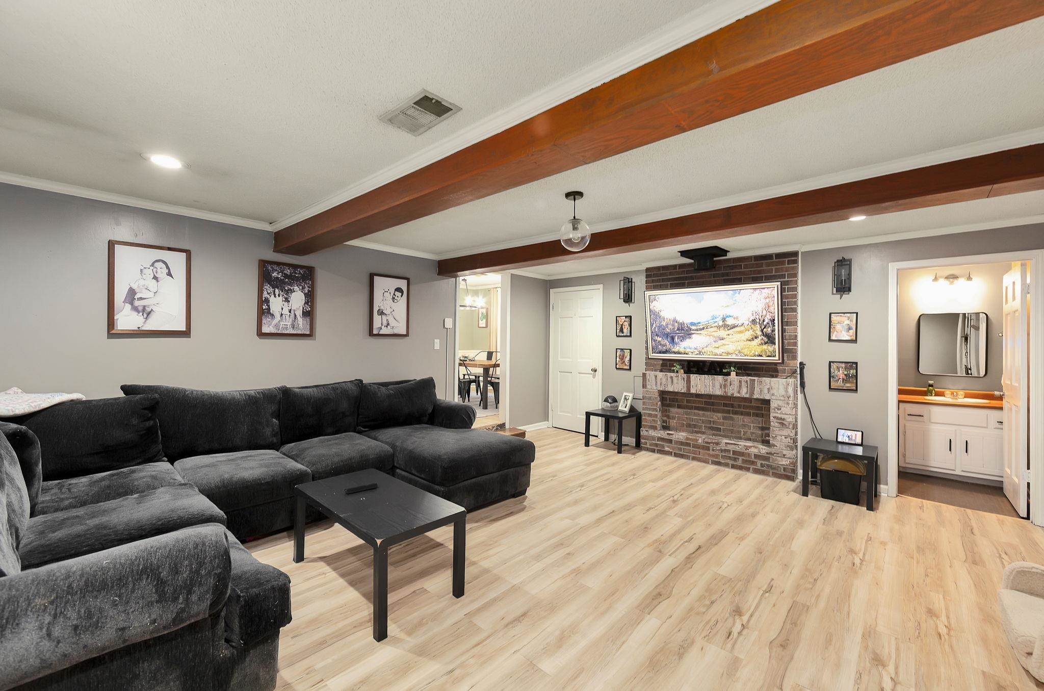 795 Burnett Mills Road Bolivar, TN 38008 - Photo 8 of 29 a living room with furniture and a flat screen tv