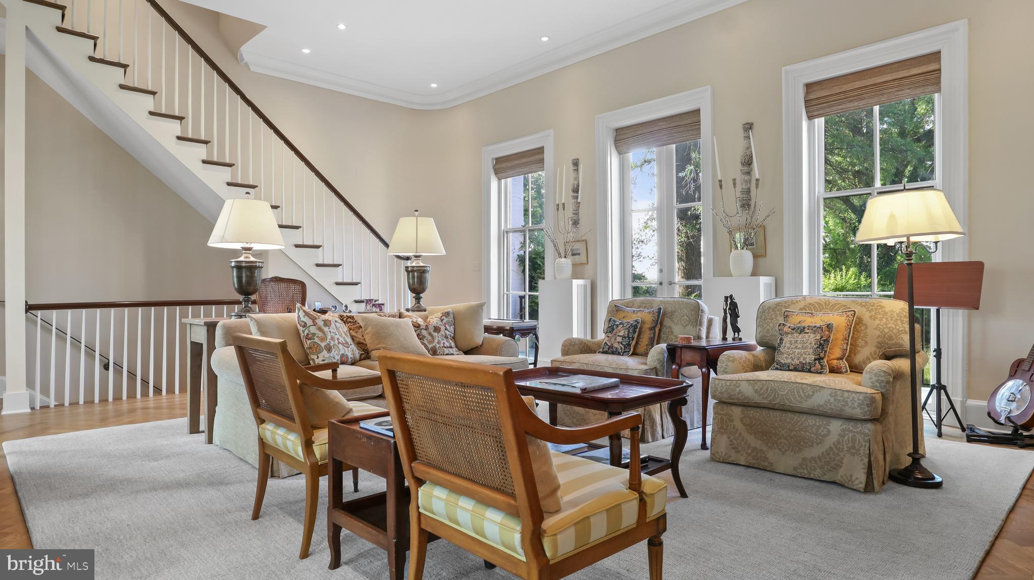 3310 R Street Northwest Washington, DC 20007 - Photo 3 of 31 Natural light beams through 6-foot windows