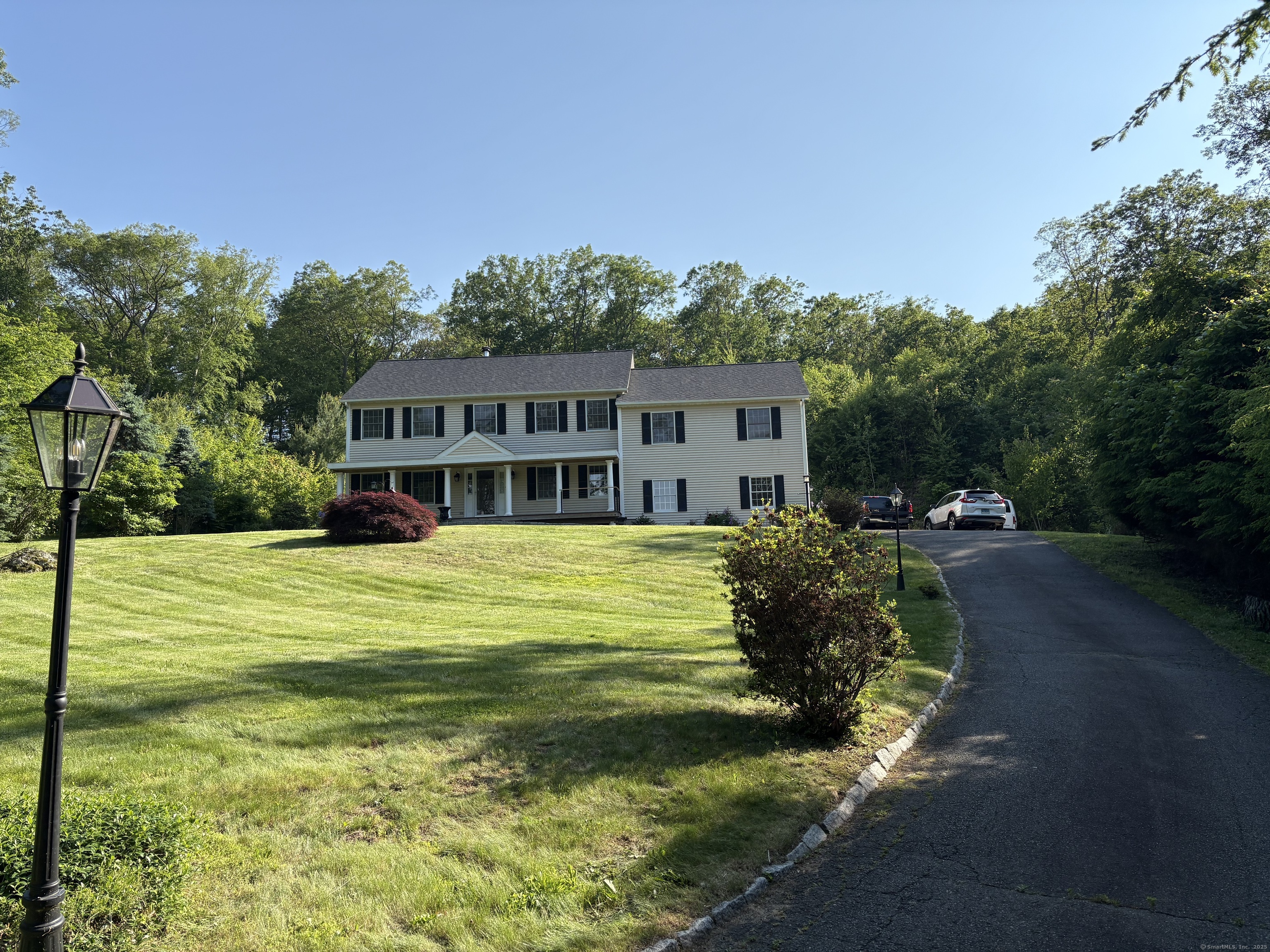 a view of a house with a swimming pool