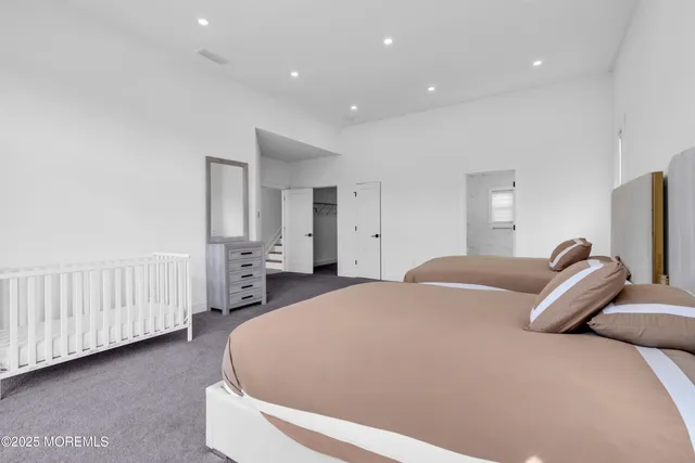 a bed room with a bed and a view