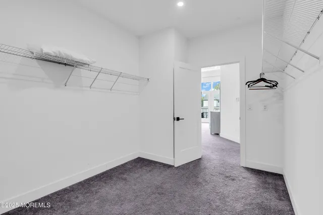 a view of a room with an empty space