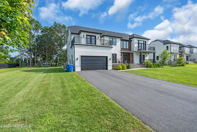 a view of a house with a big yard