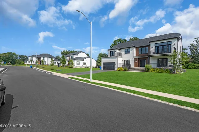 a view of a house with a big yard