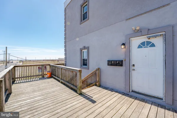 a balcony view with a wooden floor