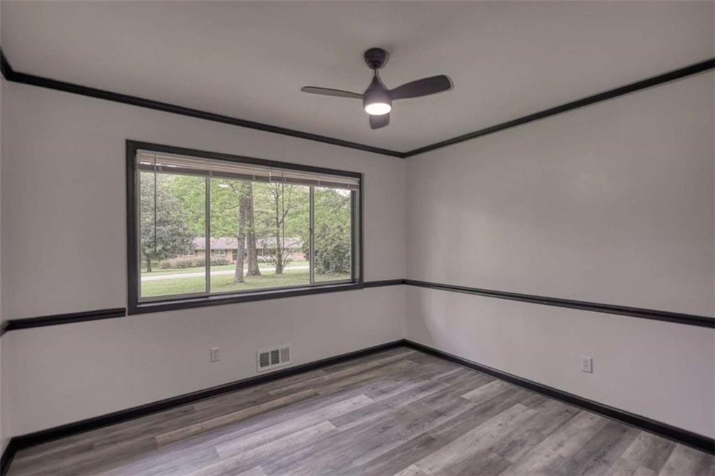 555 Joy Street Jackson, GA 30233 - Photo 36 of 56 a view of an empty room with a window