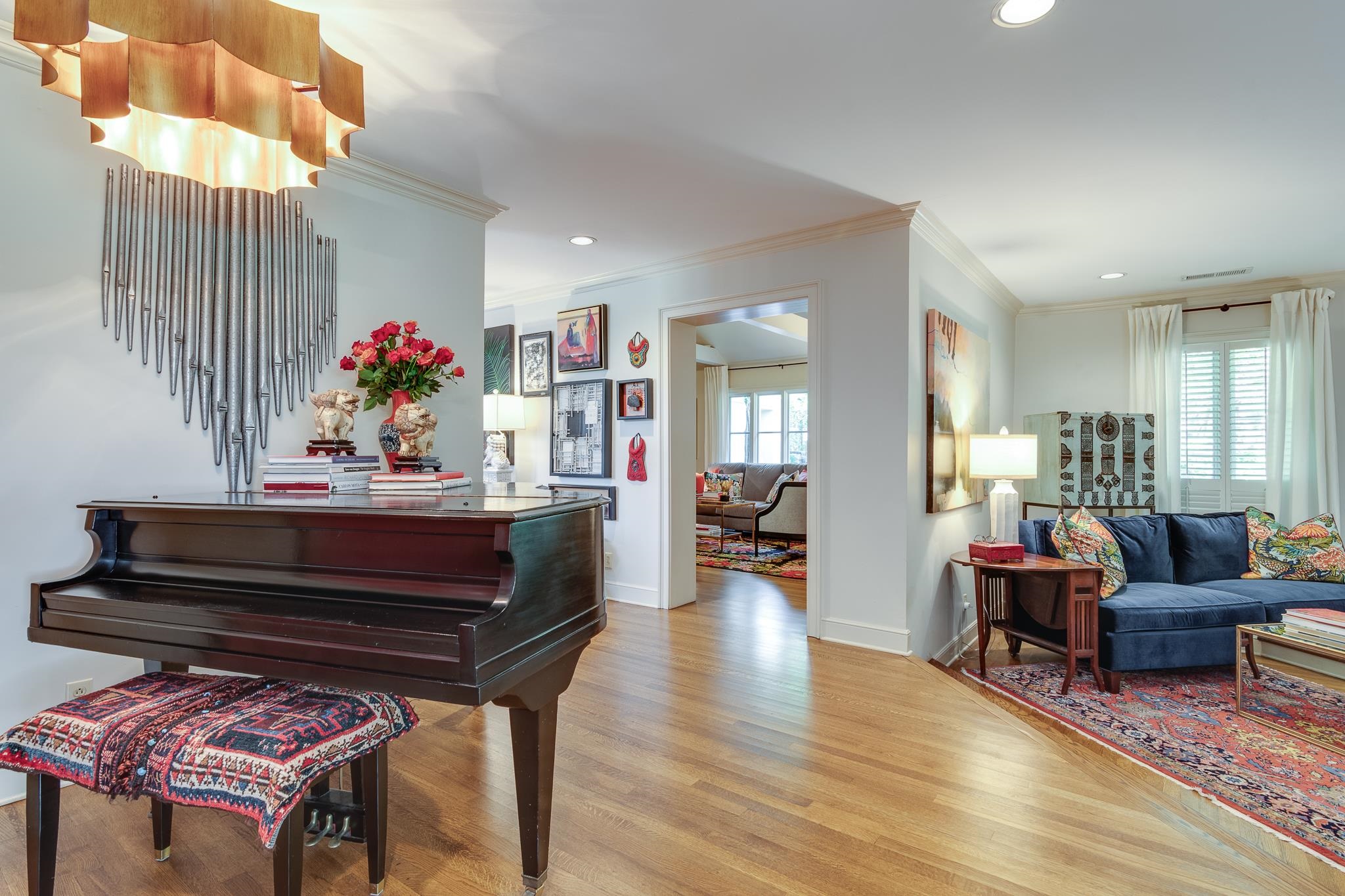 338 Greenway Road Memphis, TN 38117 - Photo 25 of 40 a living room with furniture and a chandelier