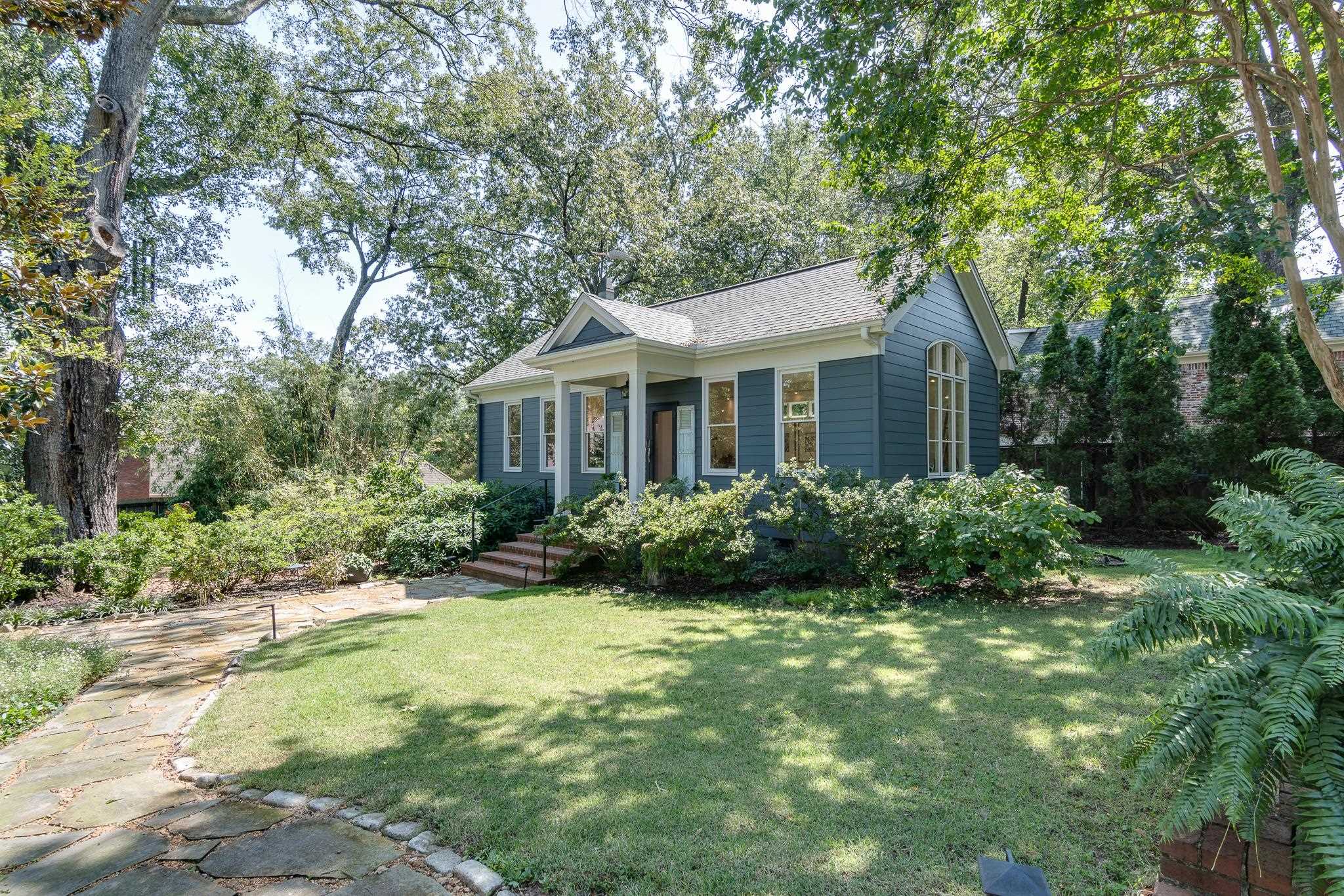 338 Greenway Road Memphis, TN 38117 - Photo 33 of 40 a front view of a house with a yard