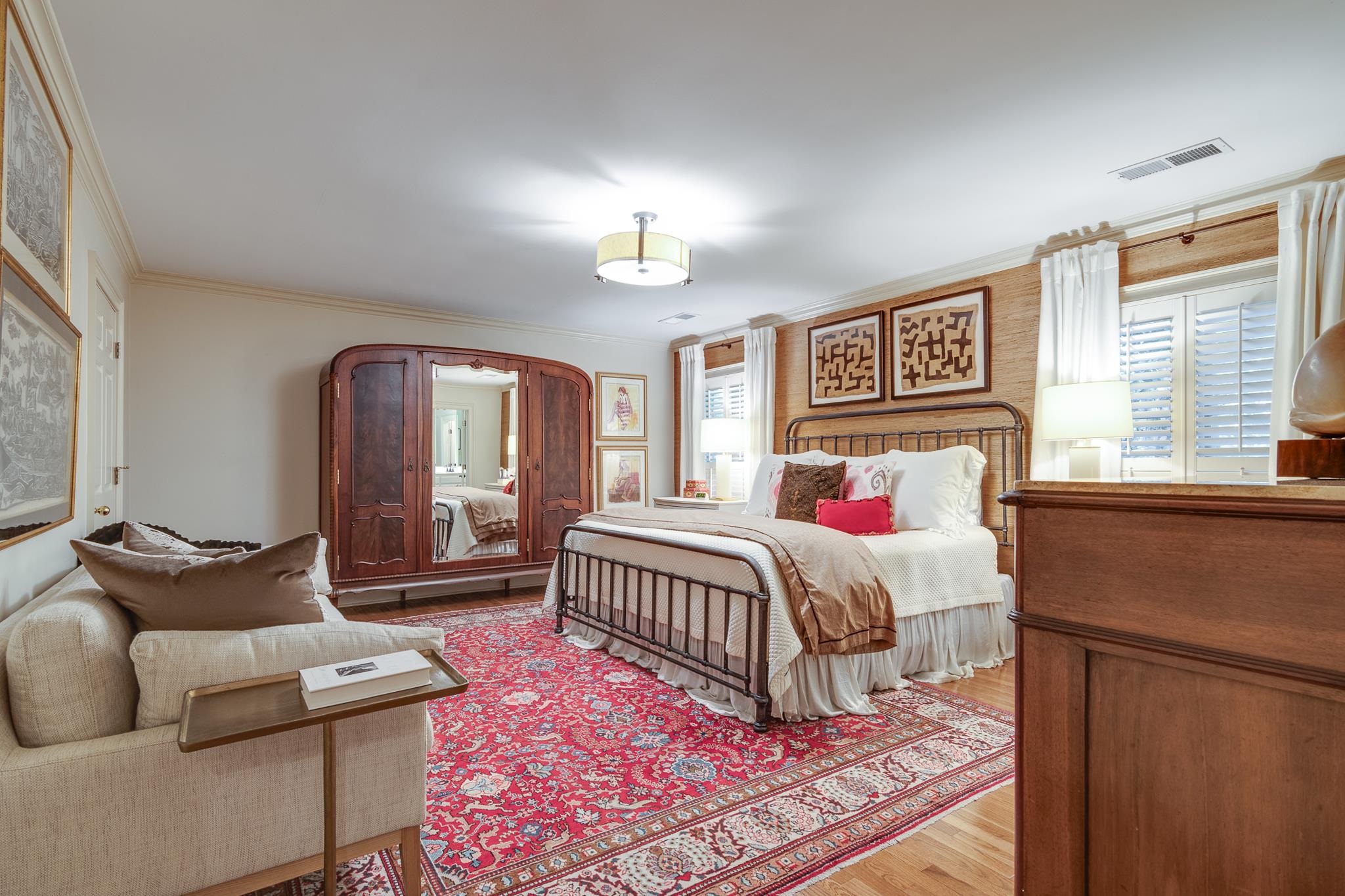 338 Greenway Road Memphis, TN 38117 - Photo 6 of 40 a bedroom with a bed and wooden floor