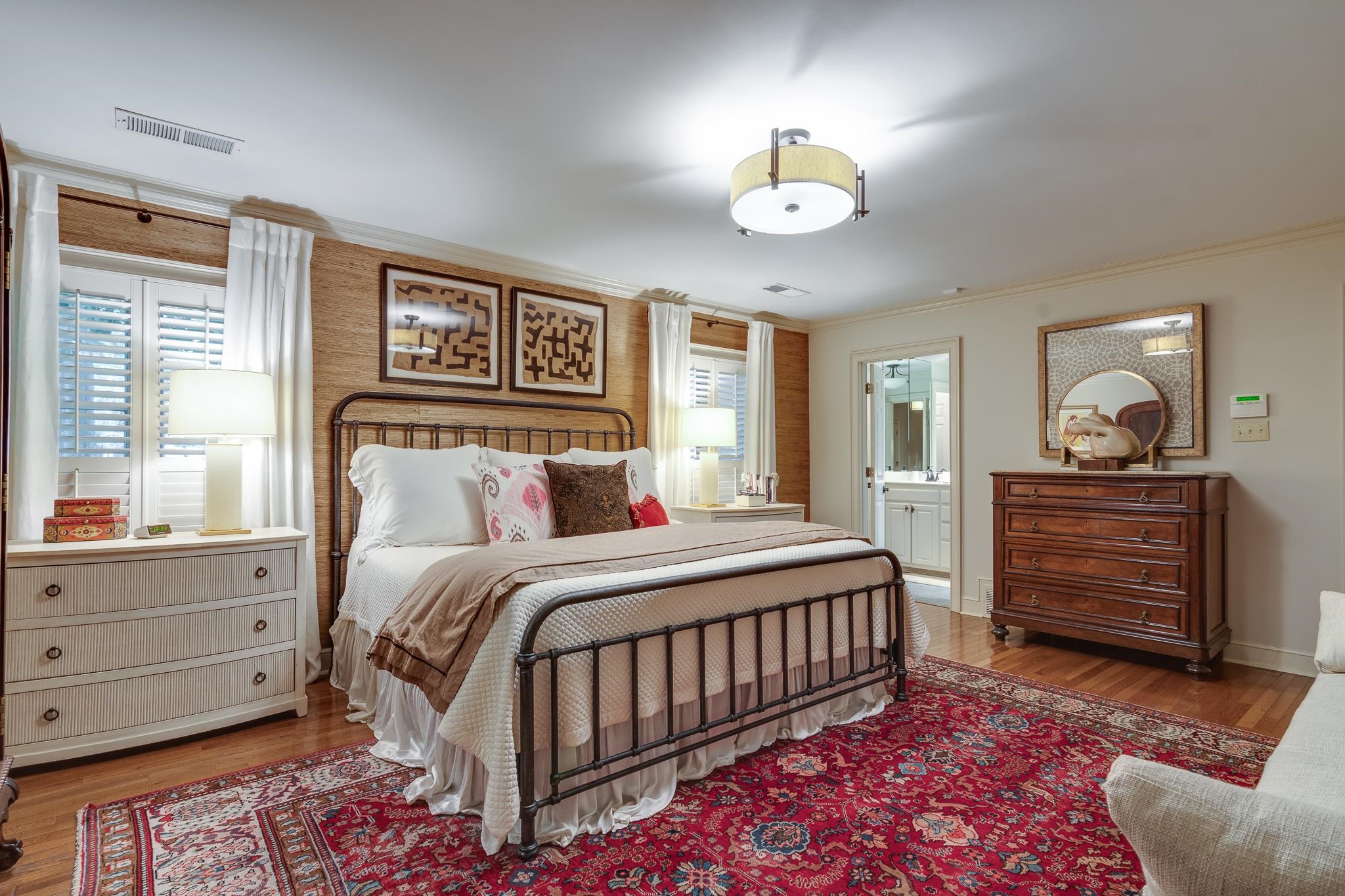 338 Greenway Road Memphis, TN 38117 - Photo 7 of 40 a bedroom with a bed and a chandelier