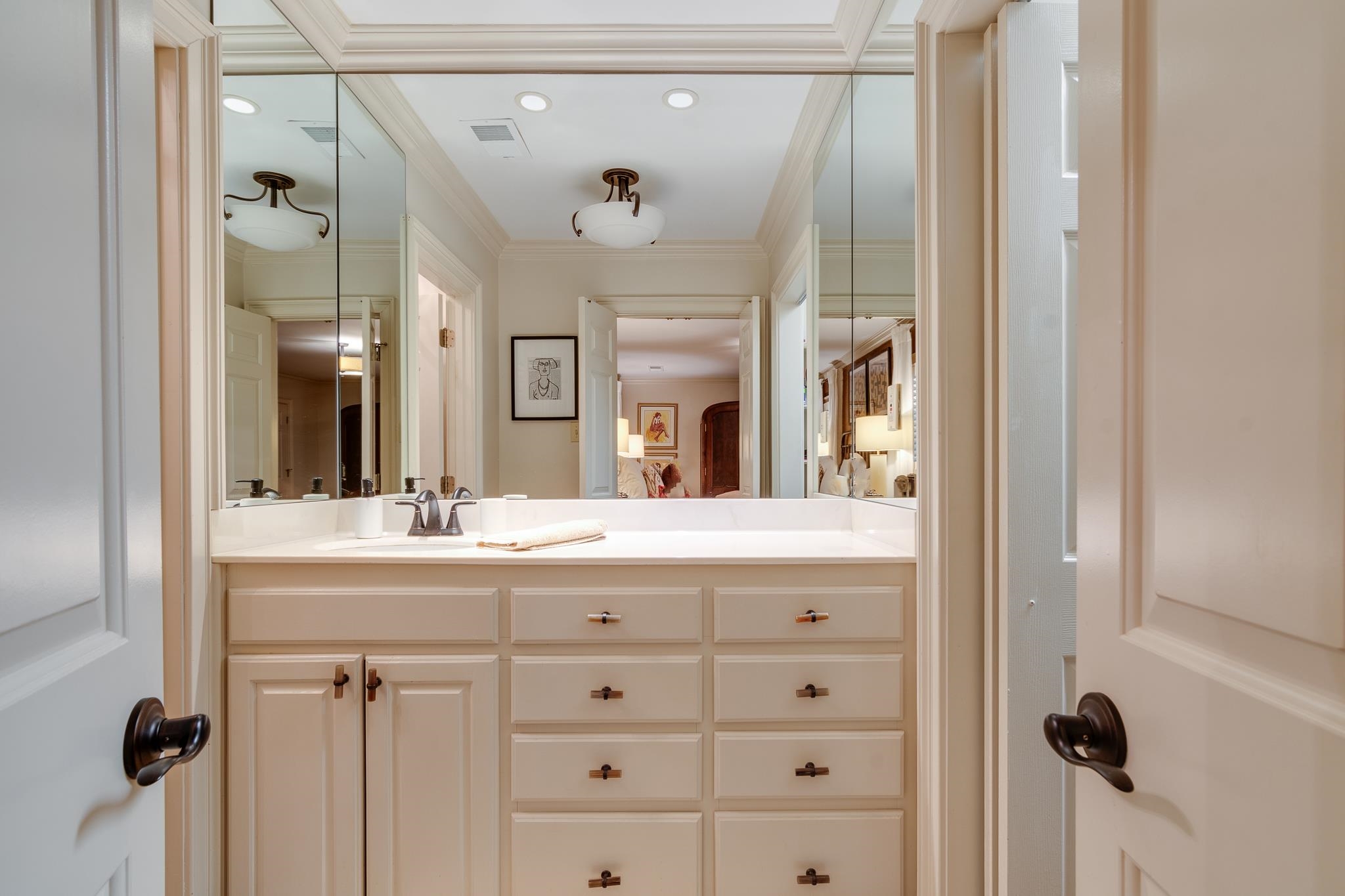 338 Greenway Road Memphis, TN 38117 - Photo 8 of 40 a bathroom with a granite countertop sink mirror and a shower