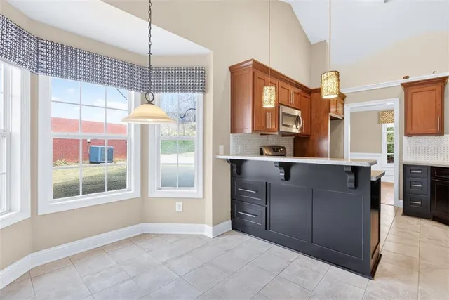 a view of a kitchen with a window
