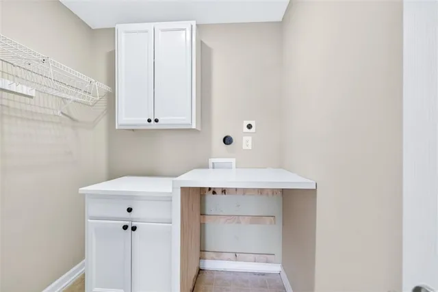 a utility room with a sink